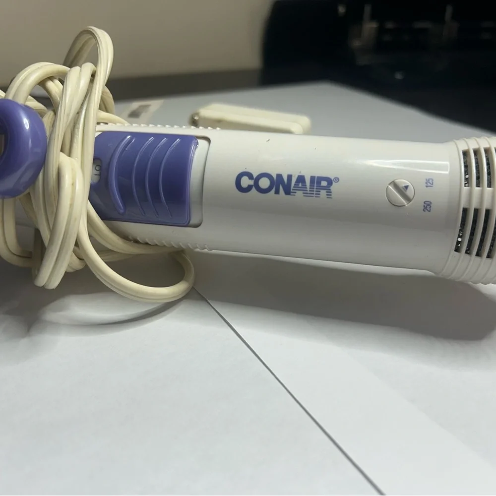 White and purple Hair Styling Tool